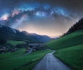 Arched Milky Way over the rural mountain road in summer in Italy Royalty Free Stock Photo