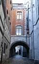 Arch passage under a building.