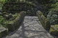 Arched stone bridge with cobbled path in Pittencrieff Park Dunfermline, Scotland, UK