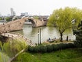 Arched stone bridge over a canal in Suzhou