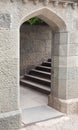 Arched stone doorway and staircase