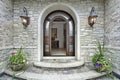 Arched stone entry to luxury home Royalty Free Stock Photo