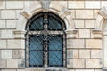 Arched window with bars