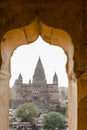 Arched window of the historic Orchha Fort in India, with its intricate architecture Royalty Free Stock Photo