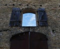 Arched window overlooking the sky