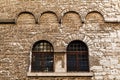 Arched Windows in Ancient House in Pula Royalty Free Stock Photo