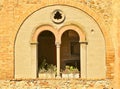 Arched windows ancient medieval building Italy