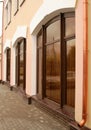 Arched windows and drain spout of copper