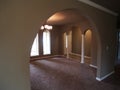 Arched Windows and front hall way of empty house Royalty Free Stock Photo