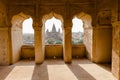 Arched windows of the historic Orchha Fort in India, with its intricate architecture Royalty Free Stock Photo