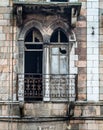 Arched windows in an old stone house Royalty Free Stock Photo