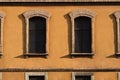 Arched Windows on Orange Facade Royalty Free Stock Photo