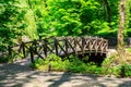 Arched wooden bridge in Sofiyivka park in Uman, Ukraine