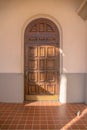 Arched wooden door of a church in downtown Tucson, Arizona Royalty Free Stock Photo
