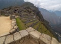 Machu Picchu terraces viewed from behind stone wall Royalty Free Stock Photo