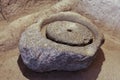 Archeological detail old grain grindstone Royalty Free Stock Photo