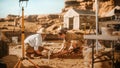 Archeological Digging Site: Two Great Archeologists Work on Excavation Site, Cleaning Cultural