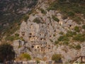 Archeological remains of the Lycian rock cut tombs in Myra, Turkey Royalty Free Stock Photo