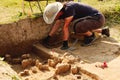 Archeological tools, Archeologist working on site, hand and tool.