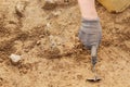 Archeological tools, Archeologist working on site, hand and tool. Royalty Free Stock Photo