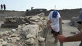 Archeology, Worker digging with a shovel at an archaeological site, Phanagoria Expedition, Russia, August 2021