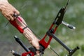 Archer pulls on the sport bow string, taking aim at his target at the competition