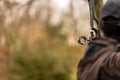 Archer takes aim with a hunting compound bow Royalty Free Stock Photo