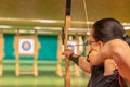 Archery as a sport discipline run in the hall and in the nature. Competition for the best shot an arrow into targets Royalty Free Stock Photo