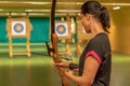Archery as a sport discipline run in the hall and in the nature. Competition for the best shot an arrow into targets Royalty Free Stock Photo