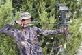 Archery hunter with bow Royalty Free Stock Photo