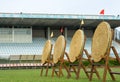 Archery straw empty targets in wooden stands