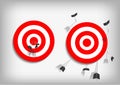 Archery targets and missed arrows on gray background