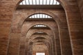 Arches and bricks in the central hall at National Roman Art Muse