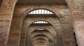 Arches and bricks in the central hall at National Roman Art Muse