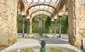 Arches and columns with fountain and pond in El Clot park, Barcelona