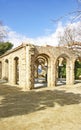 Arches and columns with fountain and pond in El Clot park, Barcelona