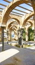 Arches and columns with fountain and pond in El Clot park, Barcelona