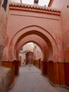 Arches in front of the 14th century Ben Youssef Madrasa, islamic college, in the Medina of Marrakech, Morocco.