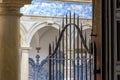 Arches and gate in the inner courtyard of an old historic convent Royalty Free Stock Photo