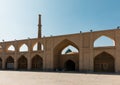 Arches of Imam Ali Square, the historical Ali Minaret in Ali Mosque and green dome of Mausoleum of Harun-i Vilayat in Isfahan