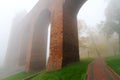 Arches of Kwidzyn castle in fog Royalty Free Stock Photo