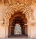 Arches of lotus temple in the ancient ruins of Hampi Royalty Free Stock Photo