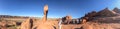 ARCHES NATIONAL PARK, USA - JULY 2, 2019: Panoramic view of Delicate Arch and tourists