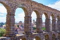 Arches of the Stone Roman Aqueduct of the Unesco city of Segovia in Spain. Royalty Free Stock Photo