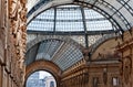 The arching glass and cast iron roof of Galleria Vittorio Emanuele II in Milan, Italy.