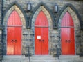 Architec: 3 Red Church Doors Royalty Free Stock Photo