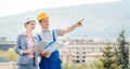Architect and builder developing ideas for construction project Royalty Free Stock Photo