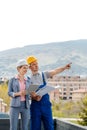 Architect and builder developing ideas for construction project Royalty Free Stock Photo