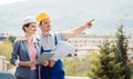Architect and builder developing ideas for construction project Royalty Free Stock Photo