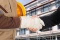 Architect and businessman shaking hands Royalty Free Stock Photo